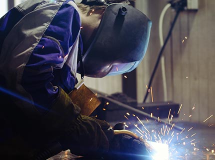 metal-worker-welding-in-metal-industry-factory-6KJYDT8